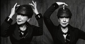 Fernanda Montenegro posa com elegância aos 96 anos, usando chapéu preto e colar de contas.